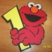 elmo holding a number one