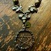 Oak and Acorn Pentacle Necklace. Copper and Brass Wire Wrapped Pentacle Pentagram Necklace with Green Beads and Oak Leaves and Acorns.