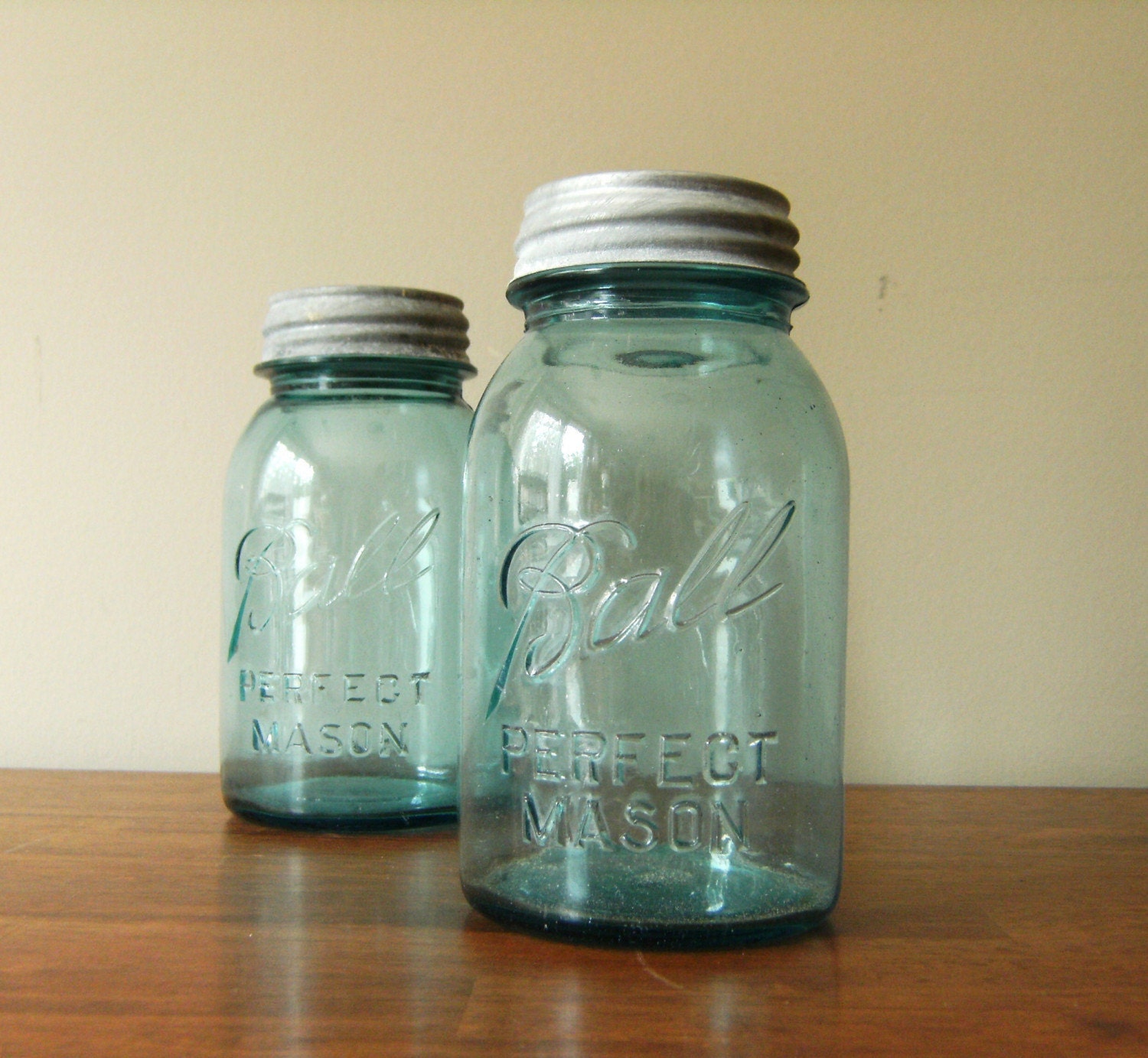 Pair of Vintage Blue Glass Ball Jars with Zinc Lids by jwhite2