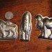 Three Vintage Tin Candy Chocolate Molds