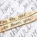 im the girl who loves you recycled bronze collar stays . woodgrain texture . recycled bronze