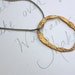 eternity necklace . artisan aged bronze circle necklace . bohemian mixed metal jewelry . woven sterling silver chain