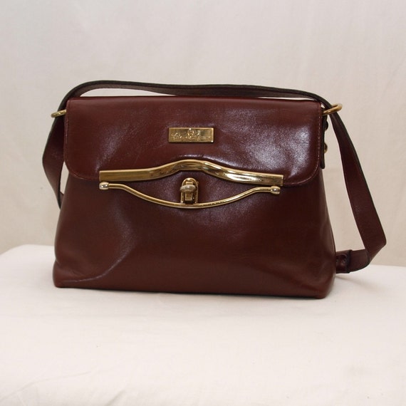 vintage burgundy leather etienne aigner handbag brass