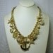 Nautical Gold Charm Necklace, July 4th, Anchors, Starfish, Ships Wheels, Sea shells, all 16 Dangles On Adjustable Chain