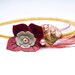 feather and flower headband with beads