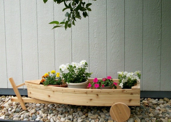 nautical all cedar boat and trailer outdoor landscape garden