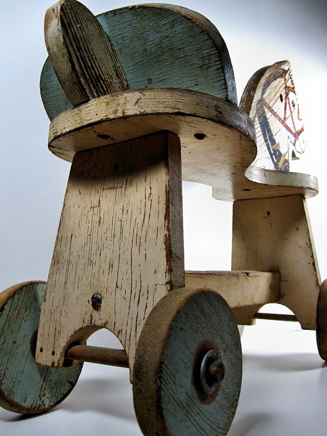 vintage toy horse on wheels