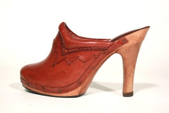 leather clogs with wooden heels