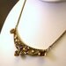 Antique silver tone bib necklace with purple rhinestones, faux pearls, Art Deco clasp