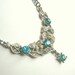 Vintage Art Deco style silver pot metal necklace with blue, white rhinestones