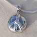 Black Friday Cyber Monday sale Clear and baby blue swirl peace necklace