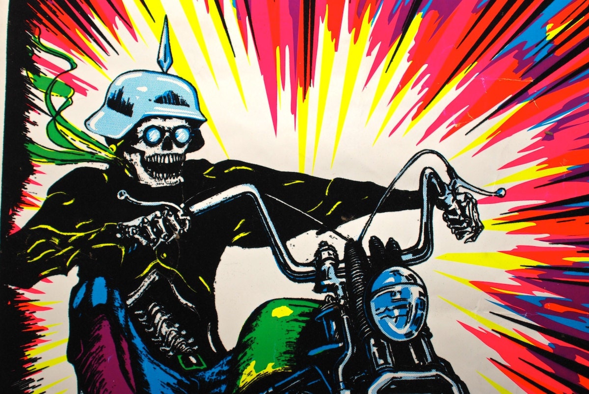 Vintage 70s highryder skeleton on motorcycle psychedelia glow
