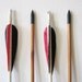vintage wooden arrows / black and red arrows