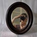 Antique Oval Wooden Mirror