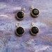 12 tiny jet-black swarovski crystal charms, gold plated setting, 7mm, c02