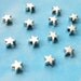 50 very tiny star beads, smooth/plain, shiny silver tone, 5mm