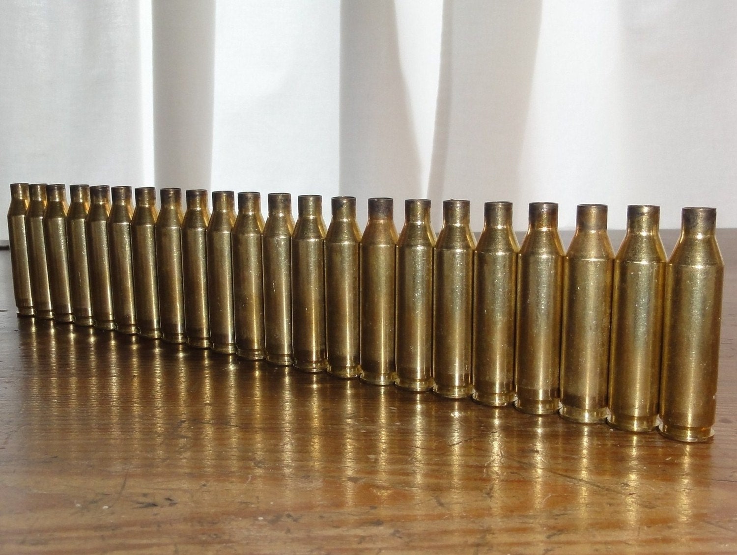 Spent .243 Brass Shell Casings 22 each