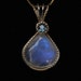 Wirewrapped Rainbow Moonstone and London Blue Topaz Pendant