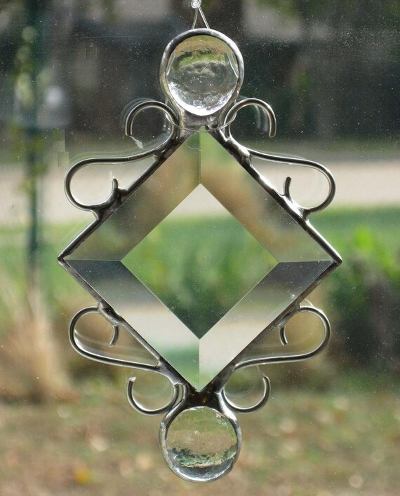 Items similar to Clear Beveled Stained Glass Suncatcher with Wire Work