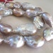 TAKE 10 PERCENT OFF ALL PEARLS SALE.. 1/2 Strand, 18-23x14-16 mm, LUXE AAA Blush of Lilac Pink Freshwater Reborn Baroque Reborn Pearls.. uber high end exotic...