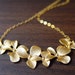 Fleur de lis orchid 14k gold necklace
