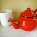vintage enamel teapot, tiny size 0.5 liter from the Netherlands in bright red with hinged lid