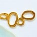 12 multi circle jewelry charm connectors in gold . 1 7/16 inches long (GT2gB)