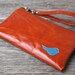 Leather Wristlet Wallet with detachable strap - Deep Blue Bird on Distressed Orange Spice