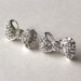 Crystal bow silver post earrings