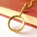 Magnifying glass necklace. Nautical. Steampunk jewelry. Victorian. Reader. Brass with gold plated brass chain.
