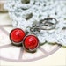 Decency petite Howlite wire wrap earrings - 8mm