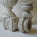 two cement urns