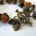 Bracelet Golden Glass Bicones and Brass Leaves