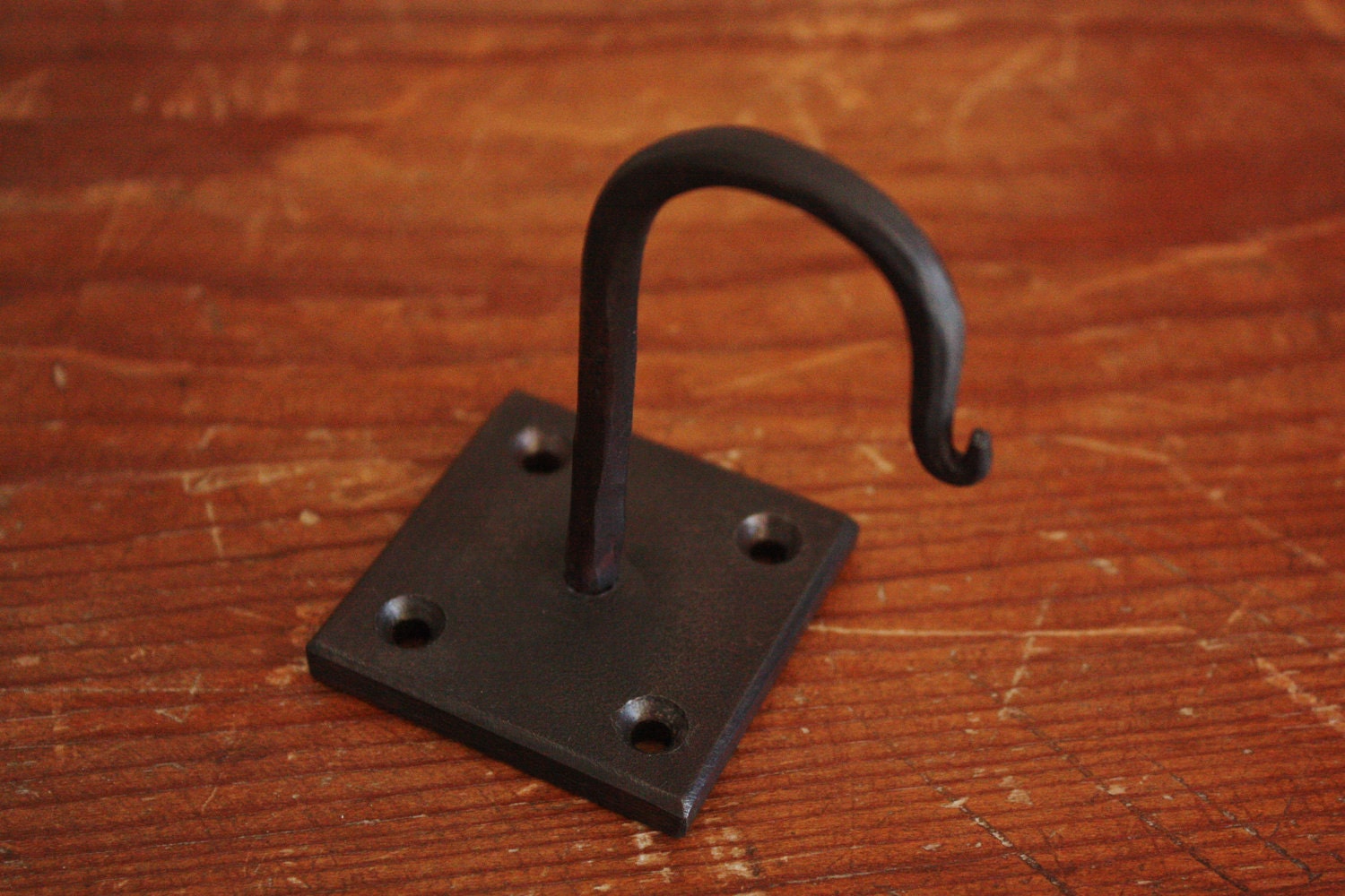 Hand Ceiling mounted hook. Great for pot racks plants