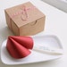 Red paper fortune cookie. Wedding, bridal shower, party favor. Love. Proposal.