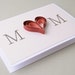 As sold in ANTHROPOLOGIE stores May 2012. Mother heart card - red, dark pink, light pink, quilling, blank card.