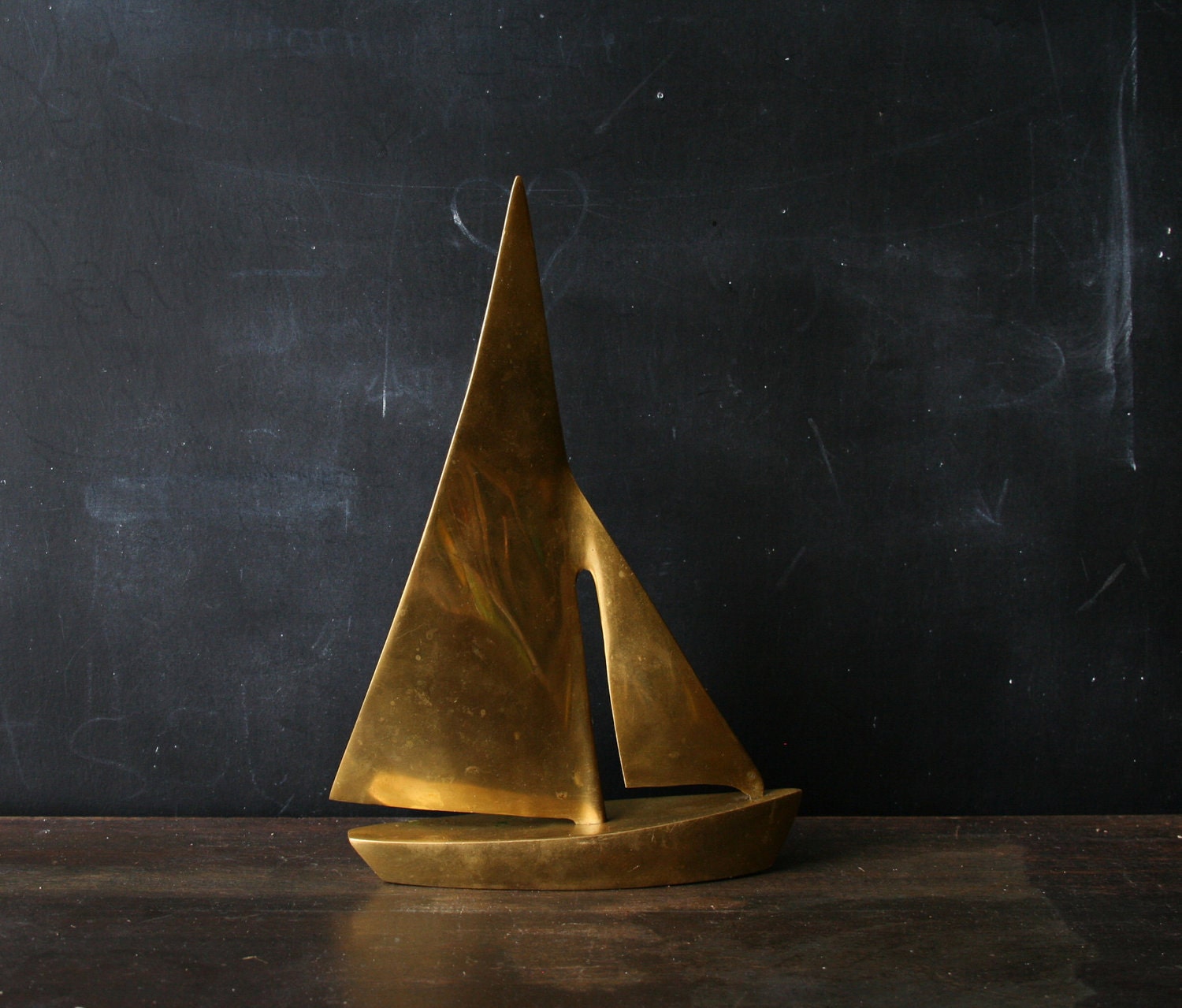 brass sailboat sculpture