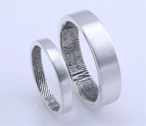 Custom fingerprint wedding bands in sterling silver two rings