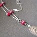 Gold tone pendant necklace with red floral painted beads. VIntage Venetian Treasure by Sarah Coventry