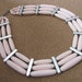 Vintage multi strand pink plastic bead necklace with silver tone spacer bars