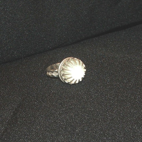 Sterling ring with clear quartz cabochon and it glows...