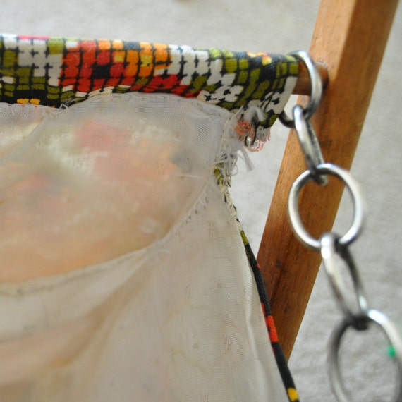 vintage sewing or knitting basket on wooden stand
