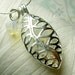 Worry Locket - opal gemstones in filigree leaf locket and sterling silver necklace