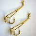 Reserved - Art Deco Brass hooks