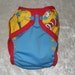 AI2 cloth diaper cover made from Cat in the hat fabric