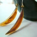 Amber crescent earrings. Brown half moons of faux tortoise shell hung from simple sterling earwires.