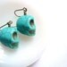 Turquoise blue skull earrings. Spooky Halloween Day of the Dead Jewelry.
