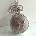 Vintage Style Silver Butterfly Pocket Watch Necklace with Chrysanthemum Flower Charm. (Medium Size)