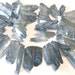 Natural rock crystal points druzy type coated smoky blue color