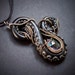 Polymer clay tentacle wire wrapped pendant with mystic amethyst